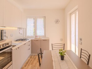 Interior Design, Furniture, Flooring, Kitchen, Wood, Countertop, Floor, Room, Home, Kitchen Appliance