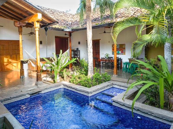 Tropical courtyard with private pool and colonial charm — your peaceful escape awaits