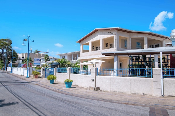 Explore our charming neighborhood. Just steps from the beach!