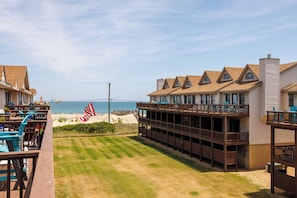 Enjoy the sight and sounds of the ocean from the upper level balcony