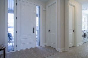 Front Entrance into Closet & Laundry Room