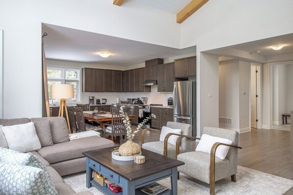 Living Room into Kitchen & towards Front Entrance