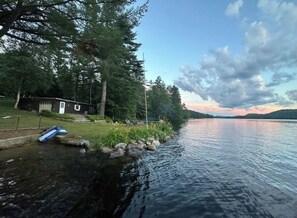 Lakeside peninsula with sandy bottom stair step in