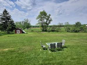 We have outdoor seating (an umbrella is available for use) as well as a fire pit