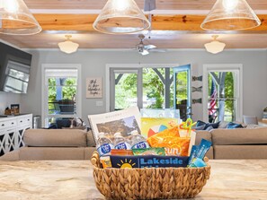 Enjoy a curated basket of treats and essentials to get you settled in.