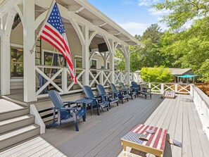 Huge deck for lounging, cornhole, and soaking in the lakefront view.