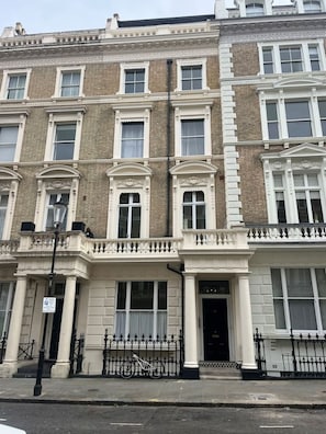 The Victorian 1870s building with the apartment on the first floor