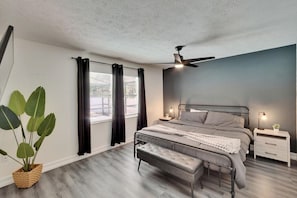 Bedroom #3 features a king bed and a private en suite bathroom