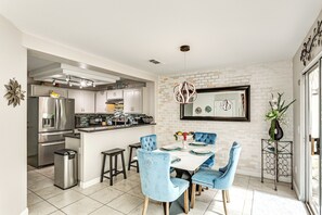Dining Area | Dishware & Flatware | Central A/C & Heat | 1st Floor
