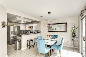 Dining Area | Dishware & Flatware | Central A/C & Heat | 1st Floor