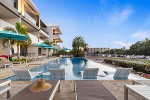 Relax in the O Condominium Sol Deck residence pool