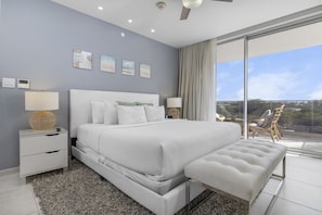 Unwind in this serene bedroom oasis, featuring a plush bed and breathtaking views. Your ideal retreat awaits!