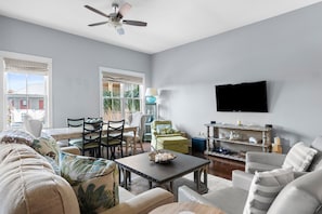Spacious and sun-filled living area with modern furnishings.