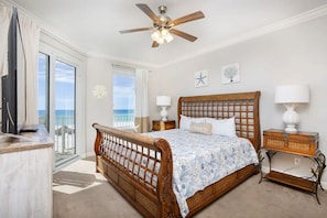 Gulf front master bedroom with a king size bed.