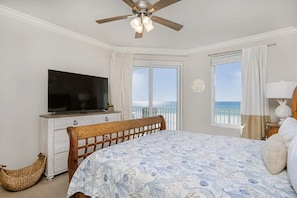 Gulf front master bedroom with a king size bed.