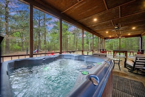 Bask in bubbling bliss on the private patio hot tub
