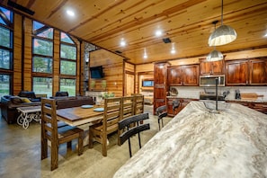 Make mealtime memories together in the dining area, with total seating for 12