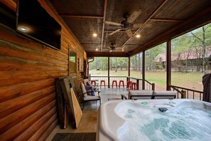 Bask in bubbling bliss with a smart TV on the patio