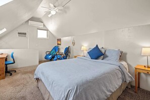 Unwind in your comfortable bedroom with a queen-sized bed.