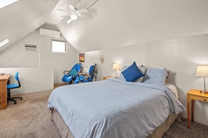 Unwind in your comfortable bedroom with a queen-sized bed.