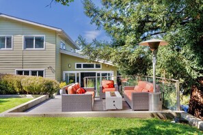 Private deck with seating area and fire pit