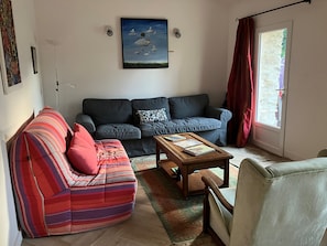 Living room with door to terrace