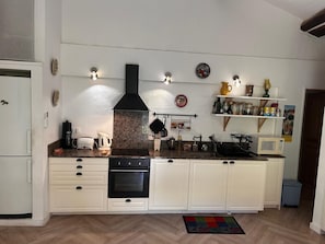 Compact and well-stocked kitchen