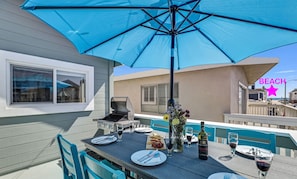 Ocean-view patio table for six—perfect for sunset dinners and breezes.