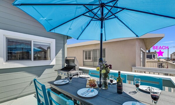 Ocean-view patio table for six—perfect for sunset dinners and breezes.