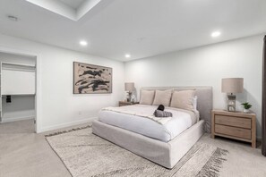 Rest peacefully in a cozy, well-appointed bedroom with plush bedding.