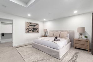 Rest peacefully in a cozy, well-appointed bedroom with plush bedding.