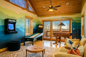 Game room: arcade, shuffle board, foosball table, air hockey, various games 