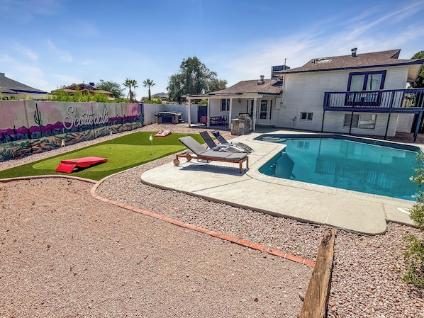 Swim, sunbathe, or snap pics—your desert paradise with a pool and mural awaits!