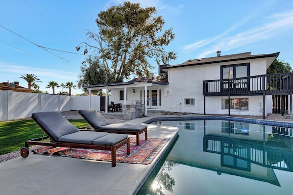 Host pool parties or chill solo — this backyard does it all.

