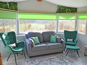 Living room | The Lodge - Island Hut Retreats, Rhosmeirch, near Benllech