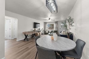 Dining Area & Living Room 🍽️ Gather around the dining table in a space made for connection and comfort.