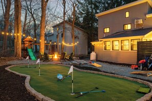 Fun for all ages: putt-putt, fire pit, and a kids' playground for endless outdoor enjoyment!