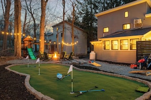 Fun for all ages: putt-putt, fire pit, and a kids' playground for endless outdoor enjoyment!