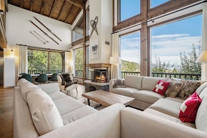 Living room with 180 degrees Mountain view and fire place