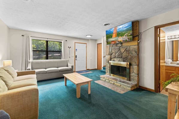 For entertainment, the room features a sleek SmartTV, providing endless options for movie nights, binge-worthy series, and more.  🚨 Fireplace is for decorative purposes only.