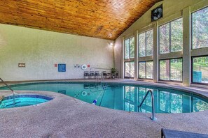 A serene pool area invites you to take a refreshing dip. 🚨 The hot tub in the pool area is NOT operational. Please do not book expecting a hot tub, as it is not listed as an amenity.