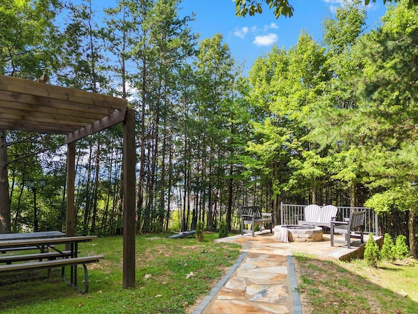 Our patio with a charming gazebo and picnic table is perfect for gatherings or quiet moments. What’s your favorite way to enjoy the outdoors?