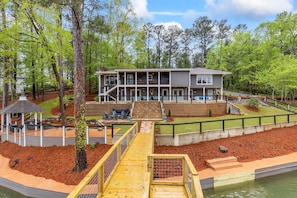 The bridge walkway from the yard to the upper dock is the perfect, easy access for everyone in your party.