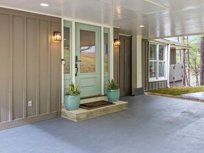 The front entry is under the carport overhang to allow for easy unloading, especially on a rainy day.