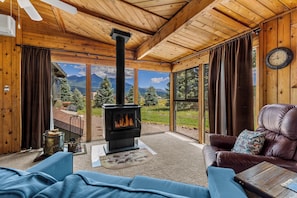 Cozy wood burning stove and views of the peaks!
