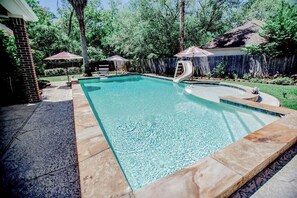The sparkling outdoor pool is fully available to the studio apartment guest.