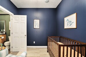 Tucked off the master bedroom, it’s the perfect setup for new parents to relax and stay close - complete with crib, rocking chair, sound machine & baby monitor.