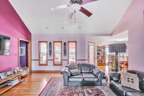 Living room with flow to back deck and dining room
