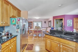 Kitchen flowing into dining room