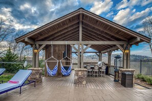 Take the vacation outdoors with our luxury pool house and outdoor kitchen
